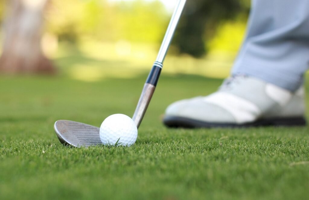 Player teeing off at one of the best Charleston, SC, golf courses