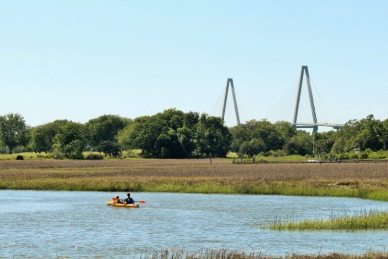 Kayak Charleston: A father and son explore an inland marsh near Charleston, SC, in a two-person kayak.
