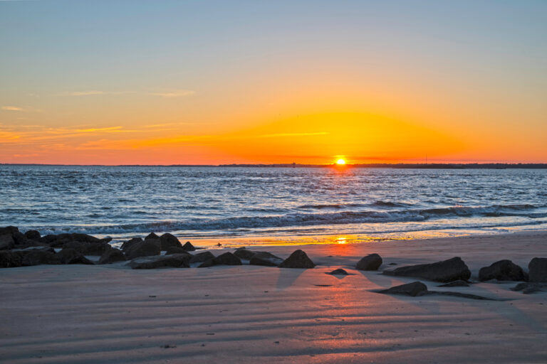 Things to Do in Sullivan's Island: A gorgeous sunset off the shores of Sullivan's Island.